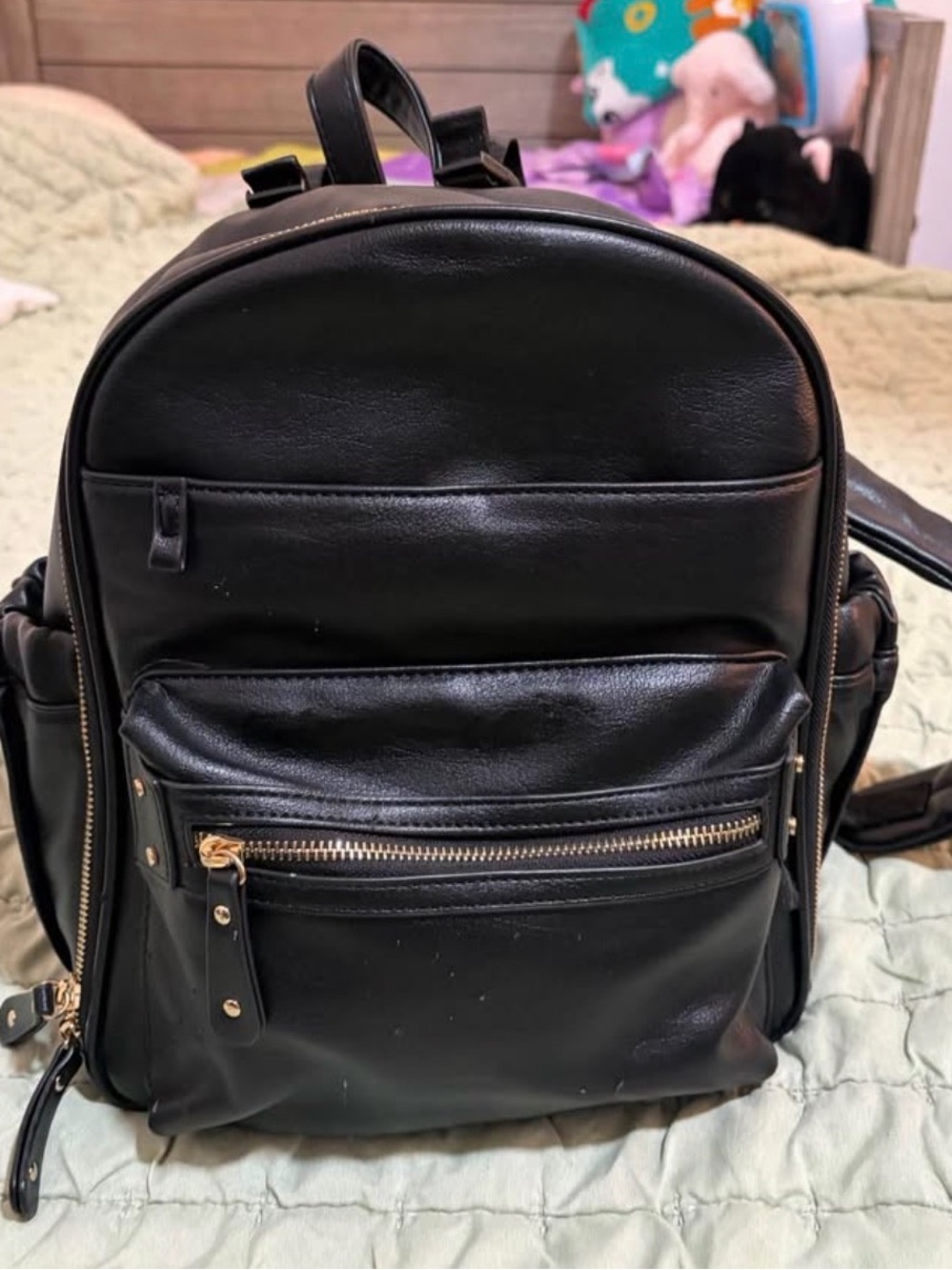 Miss Fong Black Leather Women’s diaper backpack with Gold Hardware